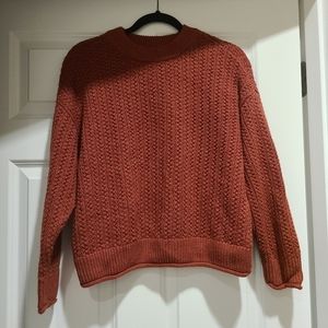 Rust sweater, runs small